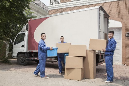 Professional removal team loading boxes in London