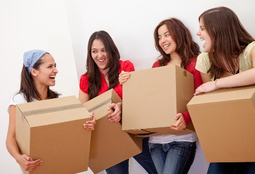 People moving boxes during a London removal and storage service