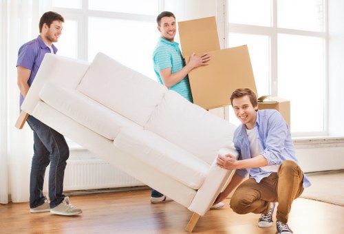 Team handling a London removals and storage service with careful packing and transport